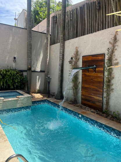 🏡 Sobrado com 4 suítes, área gourmet e piscina aquecida