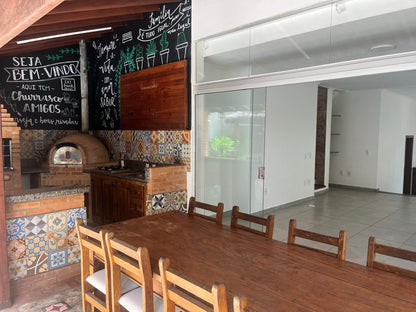 🏡 Sobrado com 4 suítes, área gourmet e piscina aquecida